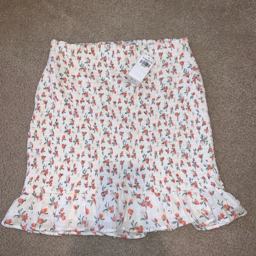 Floral smocked short skirt